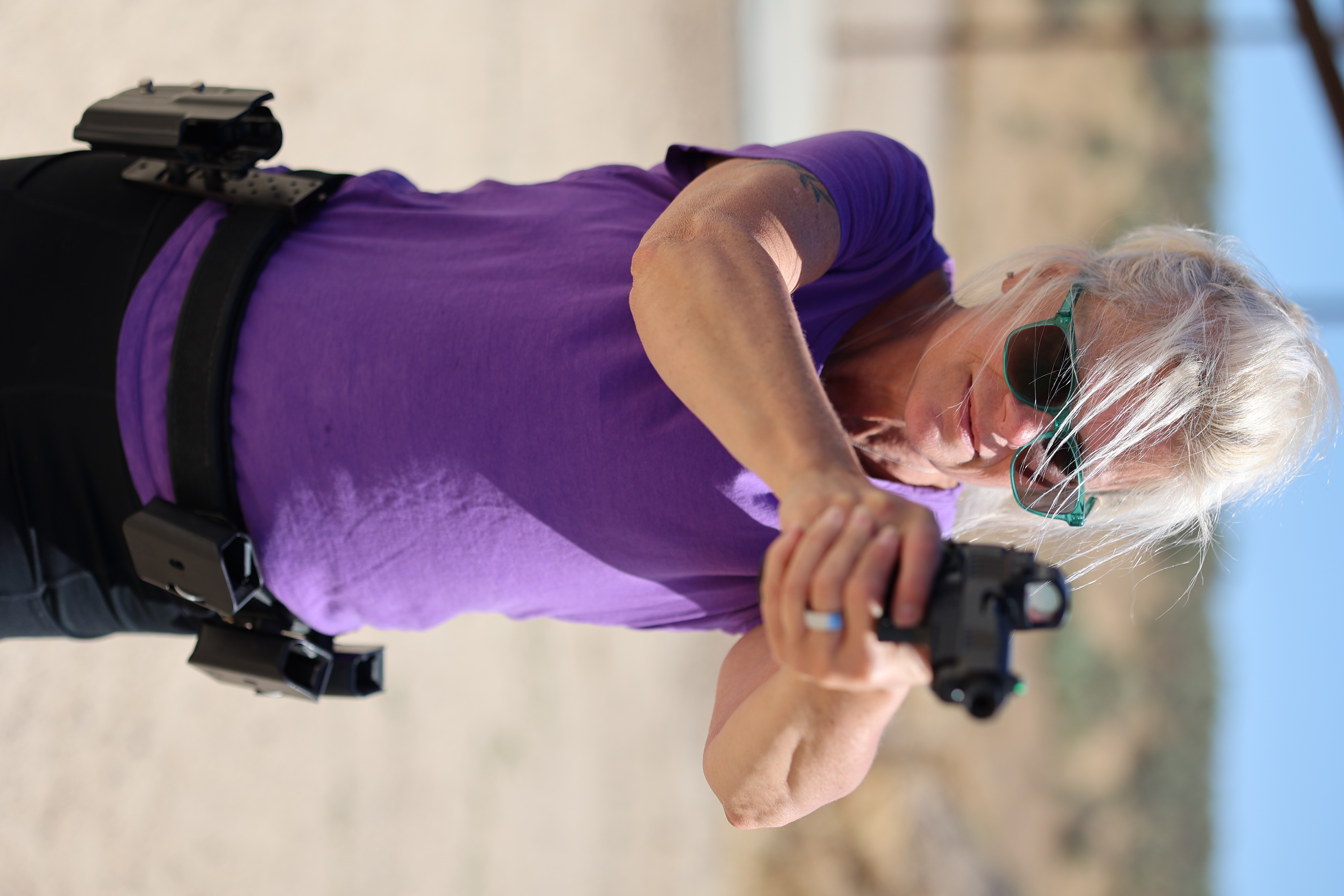 Women training at outdoor shooting range